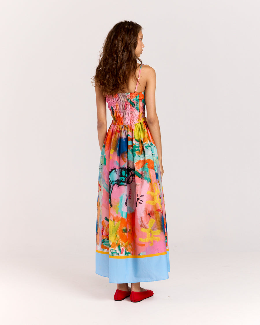 Embrace summer with the Rodeo Sundress, crafted from a breezy blend of cotton and silk. Featuring adjustable straps for a tailored fit and a flattering shirred bodice, this dress showcases a limited-edition print by artist Jake Pedro, making it the perfect statement piece for sun-soaked days.