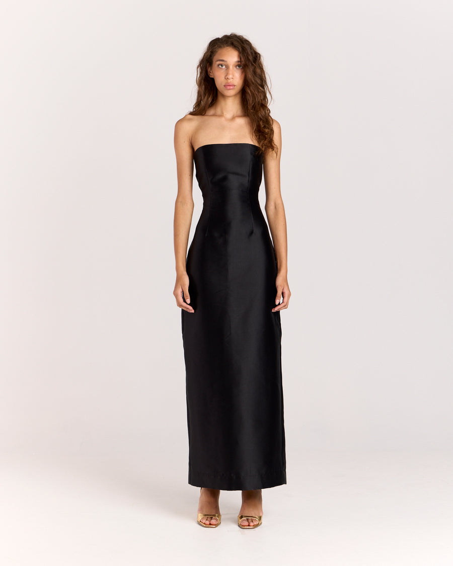 Make a statement in the Twill Column Dress, featuring a strapless fitted bodice with side boning and a stylish cut-out back with tie fastening. Fully lined and crafted from structured twill fabrication, this gorgeous maxi dress offers a sophisticated look for any special occasion.