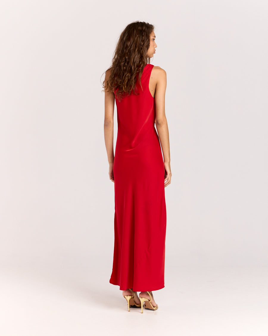 Shop the Alexis Dress, a chic bias-cut V-neck maxi dress with delicate gathering at the bust. Made from lightweight fabric that softly skims the body, this effortless slip-on style offers elegance and comfort for any occasion. 