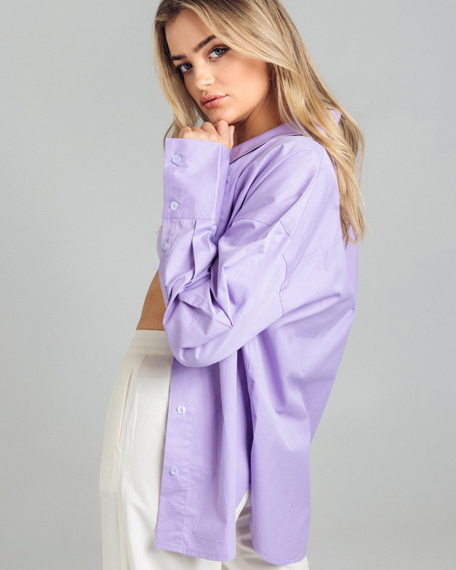 DESCRIPTION: Cotton Shirt in lilac is made from a mid weight organic cotton, it features elongated cuffs and a scooped hemline.    DETAILS: 100% Cotton Made in China   CARE: Cool Gentle Machine Wash.  SIZE AND FIT: Model is size 8 and wearing a size S